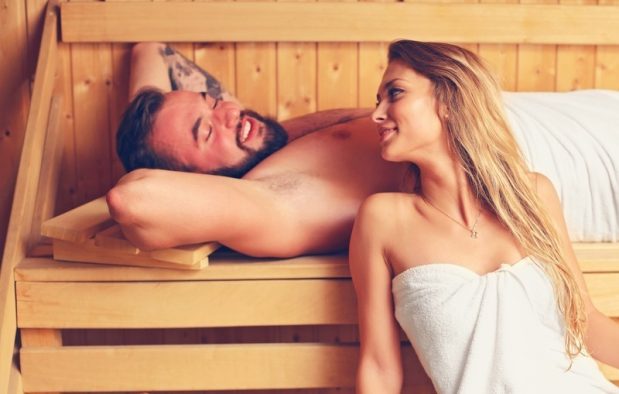 couple enjoying some downtime in a sauna