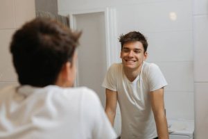 teen in mirror