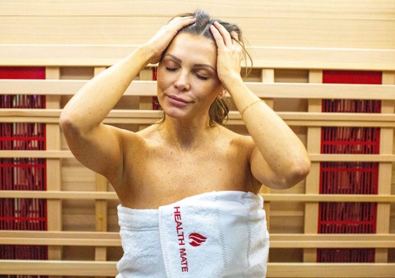 Woman detoxing in towel in Inspire 3 sauna