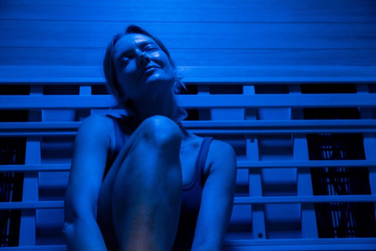 woman sitting in a sauana